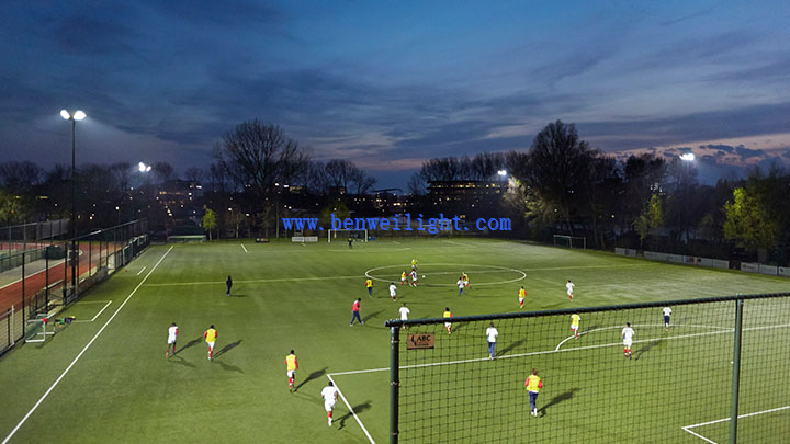 local-football-pitch-with-match-ongoing local-football-pitch-with-match-ongoing
